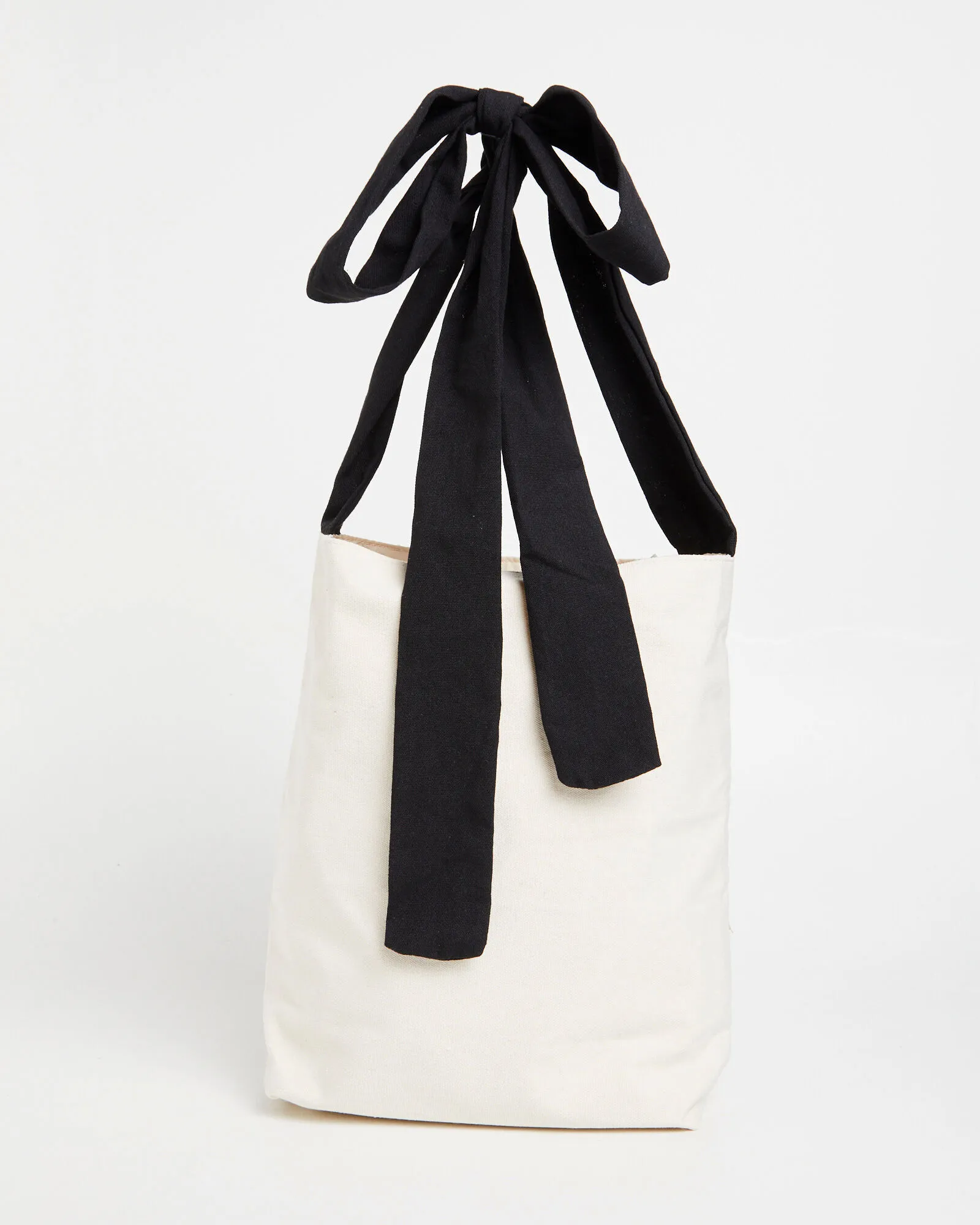 Alice In The Eve Bow Tote Bag